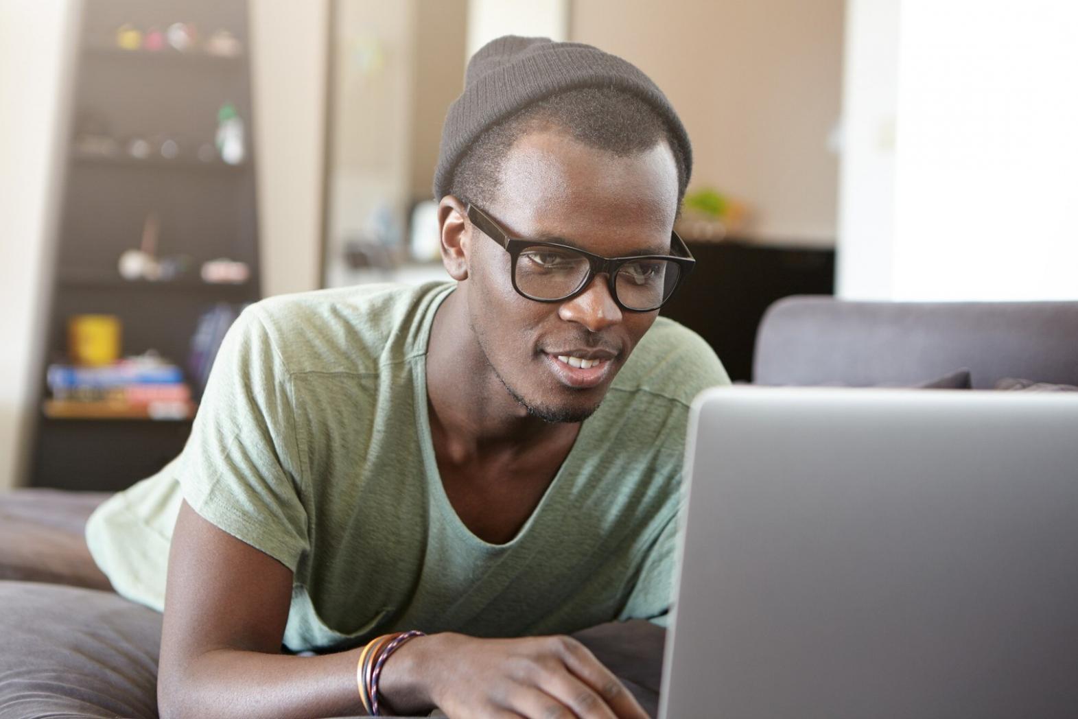 Diverse group of learners collaborating on financial planning exercises in modern classroom setting